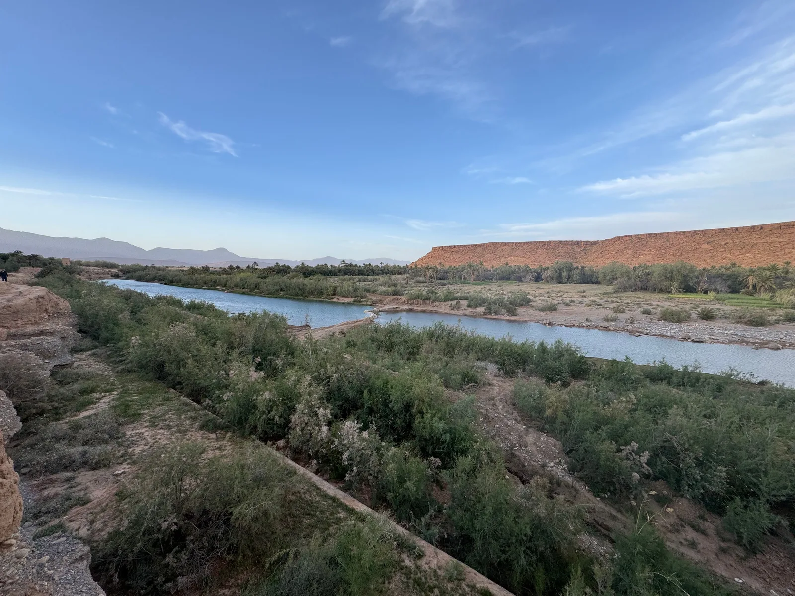 River winding through the greenery of the Draa Valley