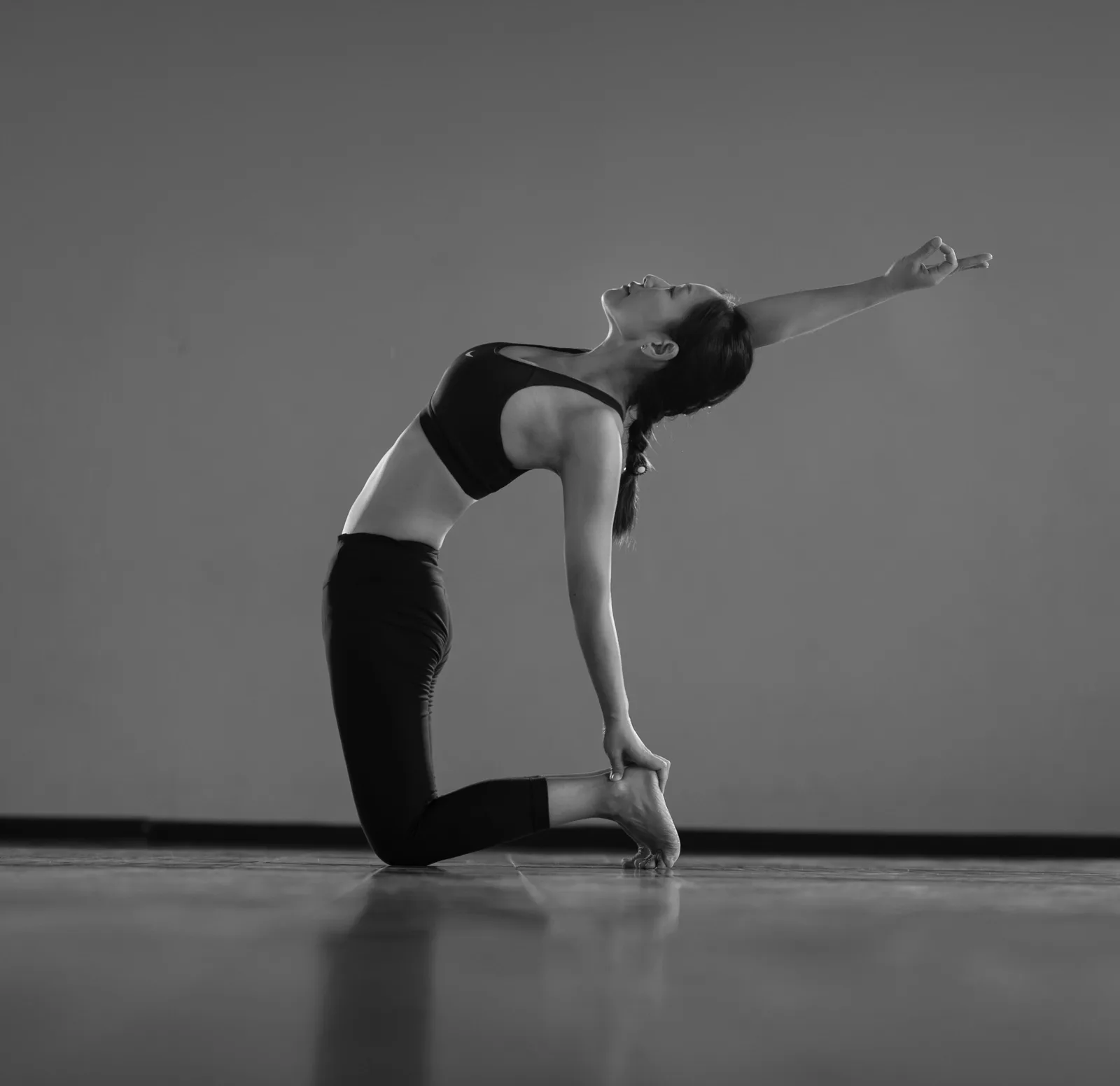 Yoga backbend practised indoors before the desert journey