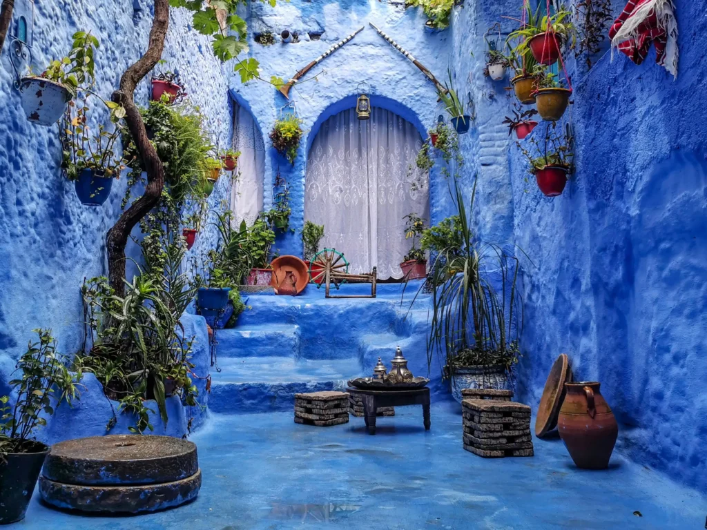 Chefchaouen Morocco blue painted streets and traditional doors in medina
