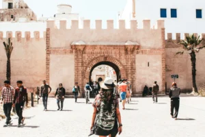 Woman exploring medina streets in the best cities to visit in Morocco