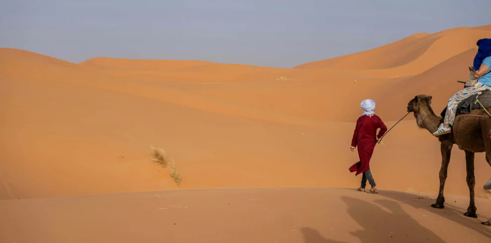 Fez Marrakech desert tour camel trekking at sunset