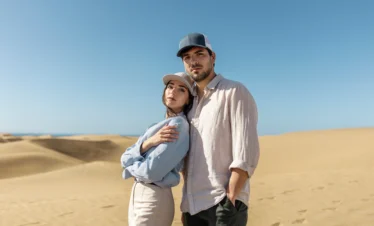 Couple enjoying sunset on a Sahara Desert Morocco Tour